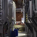 Wat is de rol van Heineken in de nederlandse industrie?